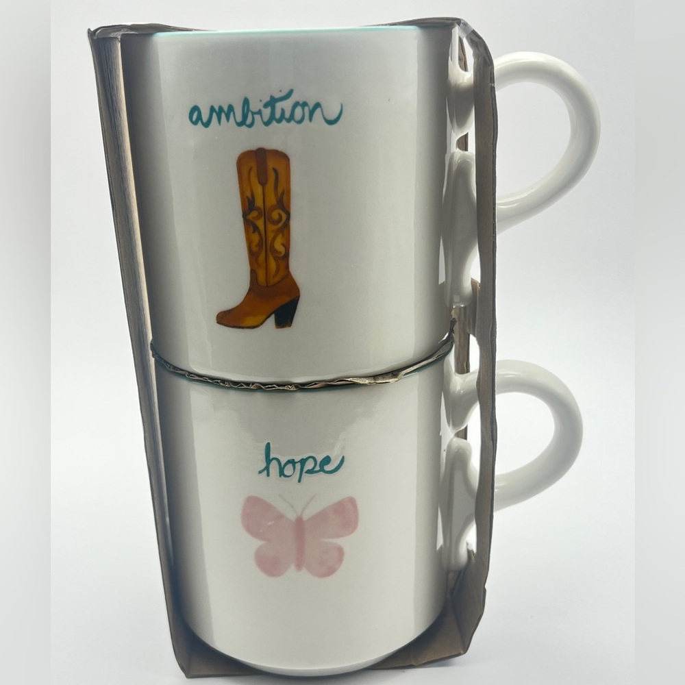 Dolly Parton 20-ounce stoneware coffee mugs. Set of 2 New in box.